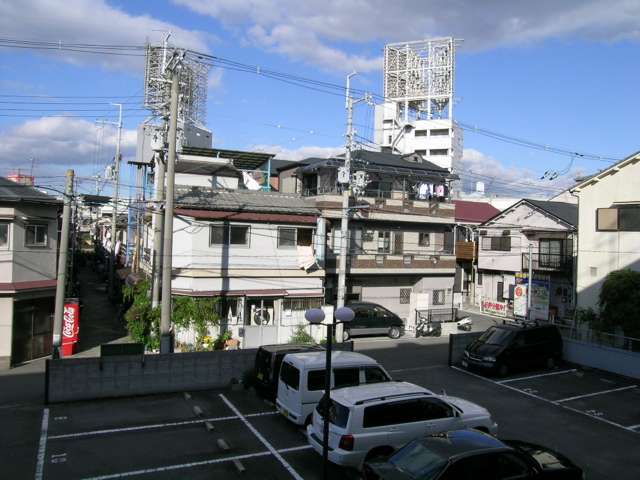 走井周辺。阪神高速空港線沿いの看板が見えています。