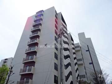 阪急南茨木ハイタウン駅前高層住宅K棟の外観（北東側から）