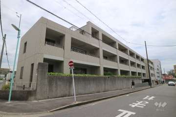 プラウド名東社口の外観（北西側から）