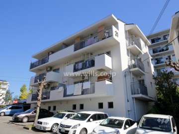 公団千里緑丘団地２１号棟の外観（南西側から）