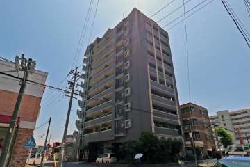 アスウェル勝川の外観（北西側から）