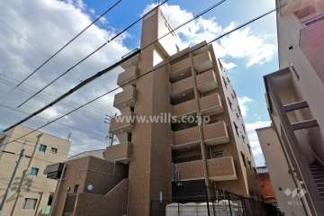 ライオンズマンション生駒町の外観（北西側から）