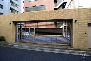 駐車場の出入り口（リングシャッター付き）・敷地内駐車場（屋外機械式）