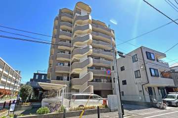 エレガンス王子神谷の外観（西側から）