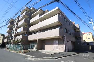 オリンポス四ツ木の外観（北東側から）