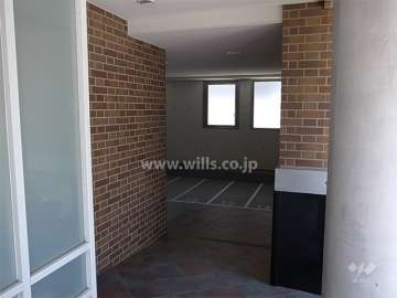 エントランス横にあるバイク置き場入口