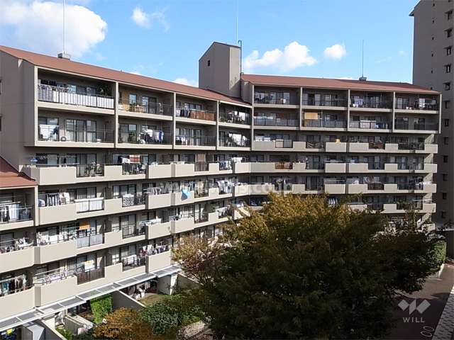 星和プラネタウン千里南第1期C棟（射手座のまち）の外観（南西側から）