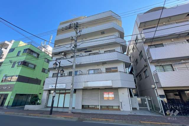 エミネンスコート多摩堤通りの外観（北西側から）