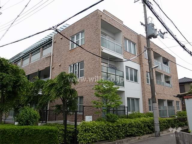 パレ武庫之荘東2の外観（北西側から）　外壁には天然石が使われています。