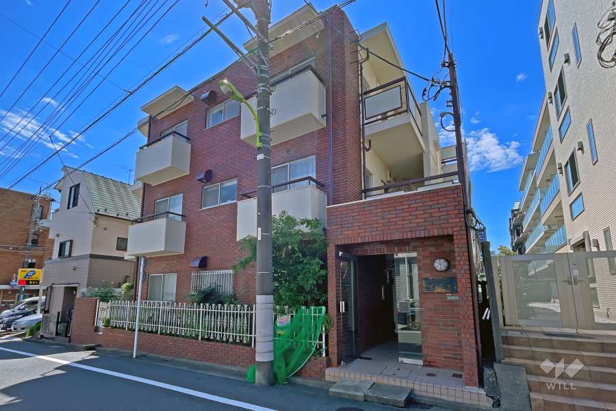 サンライズマンション弦巻の外観（北東側から）