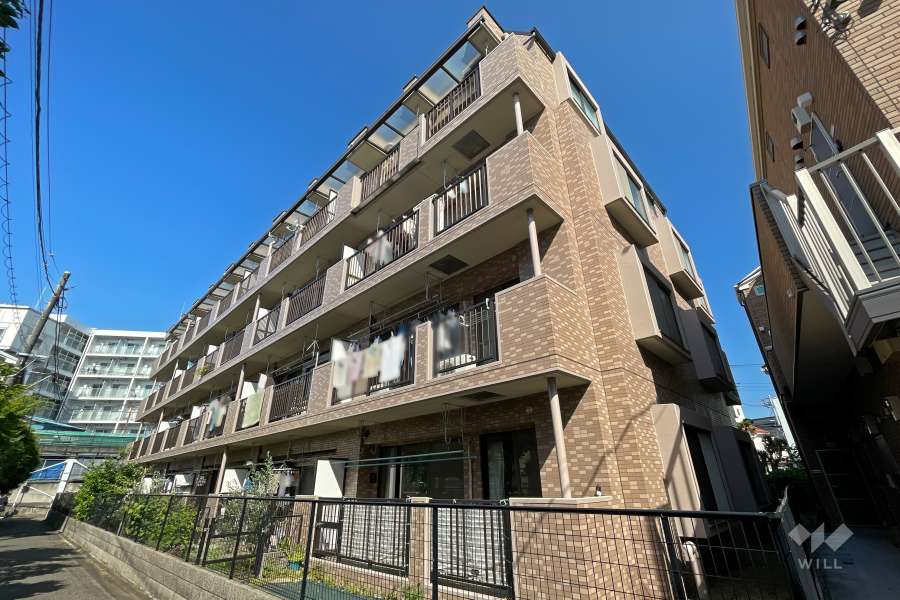 モナークマンション溝ノ口4の外観（南東側から）